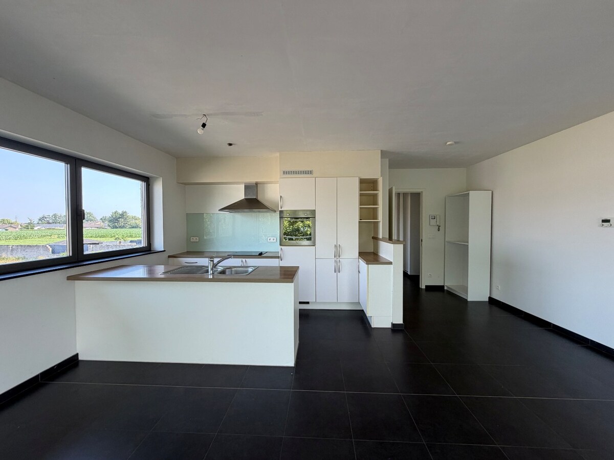 2 slpk-appartement nabij allerhande voorzieningen. 