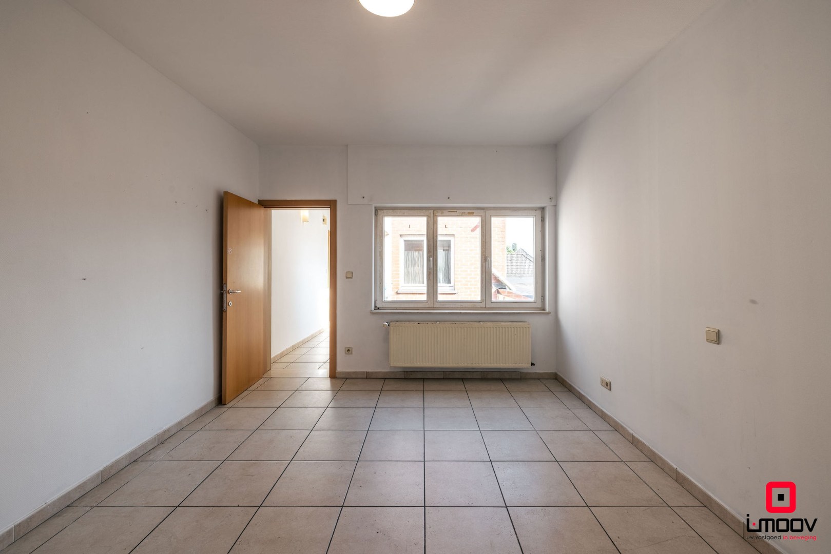 Lichtrijk en instapklaar wonen op de tweede verdieping nabij Gent 
