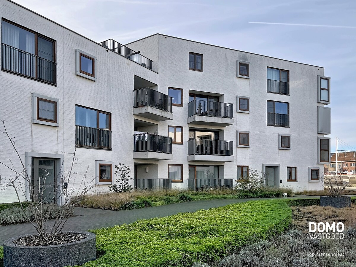 MODERN EN ENERGIEZUINING APPARTEMENT MET 1 SLAAPKAMER EN EIGEN PARKING TE BILZEN 