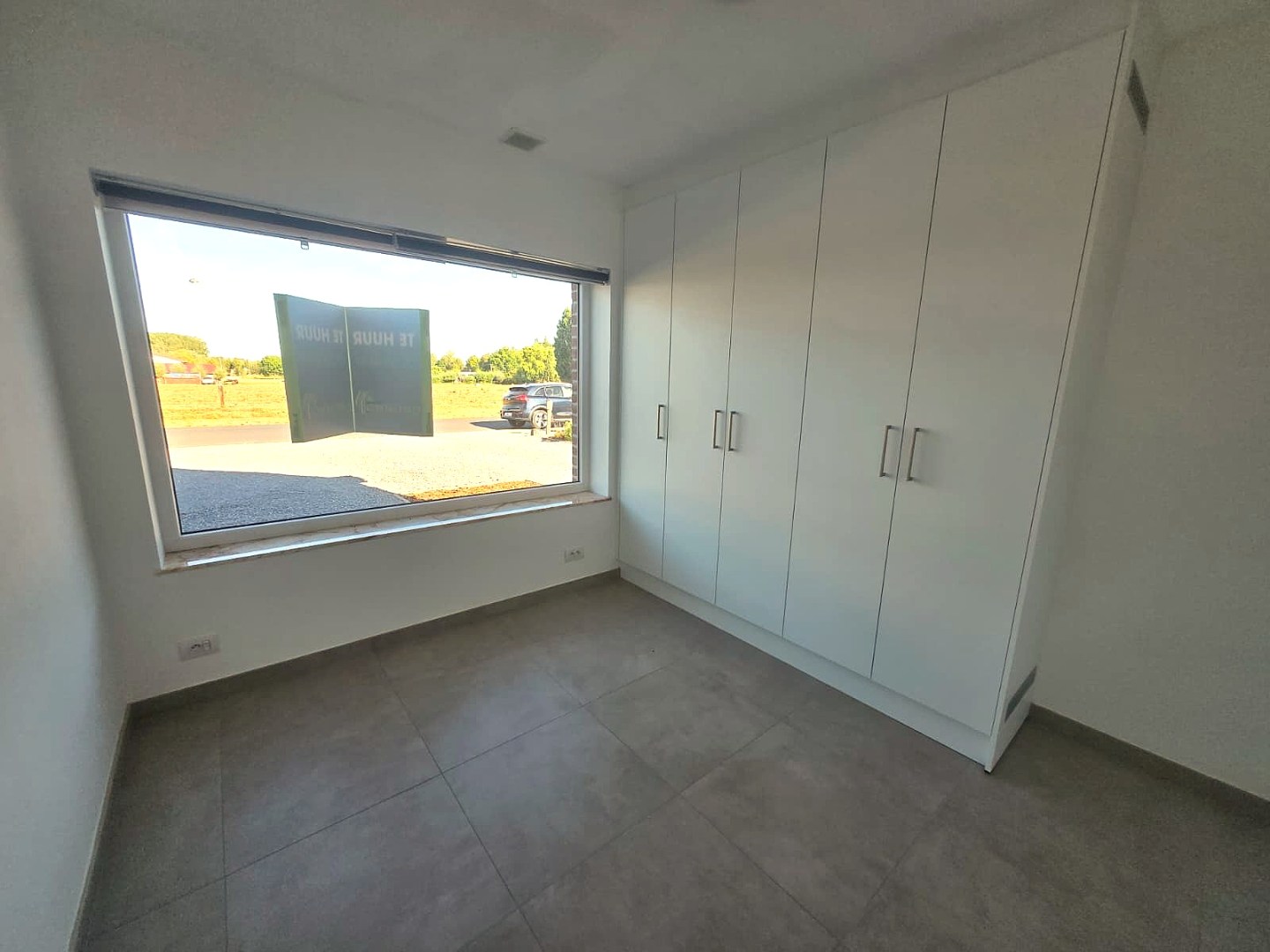 Energiezuinige halfopen woning met tuin en carport te Zulte 