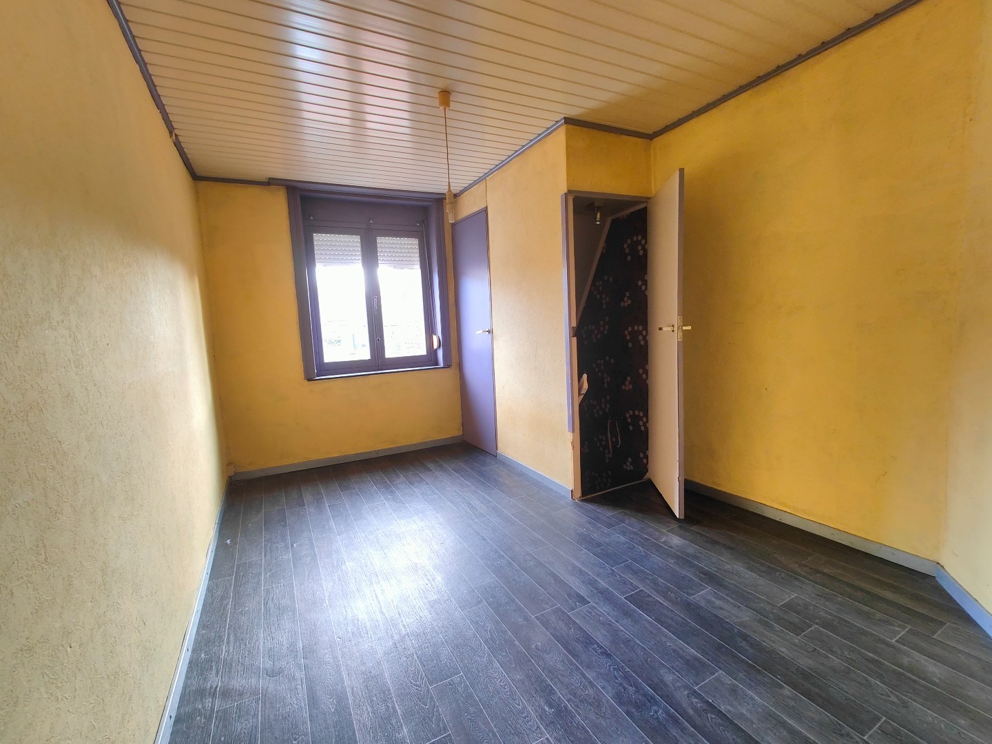 Op te frissen woning met tuin en berging op centrale ligging 