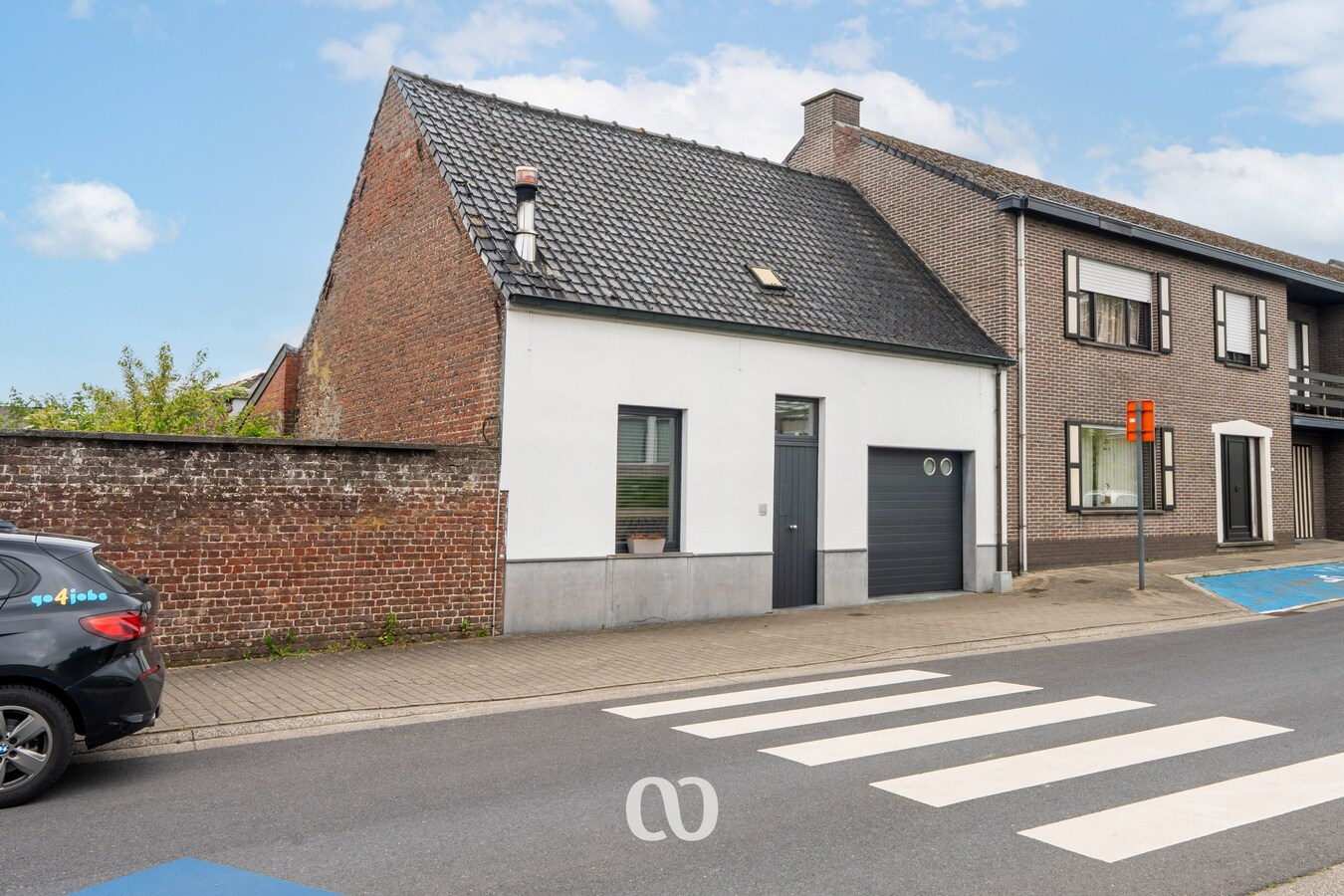 Instapklare woning met tuin en bijgebouw in het centrum van Kruishoutem 
