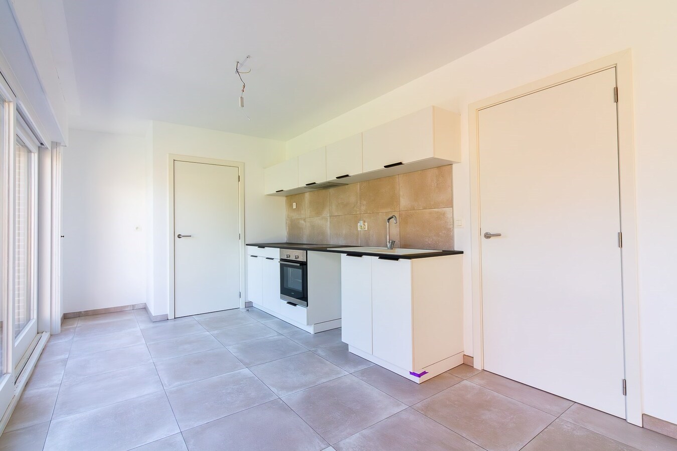 Appartement rez-de-chaussée très lumineux &amp; 2 chambres, en plein centre-ville ! 