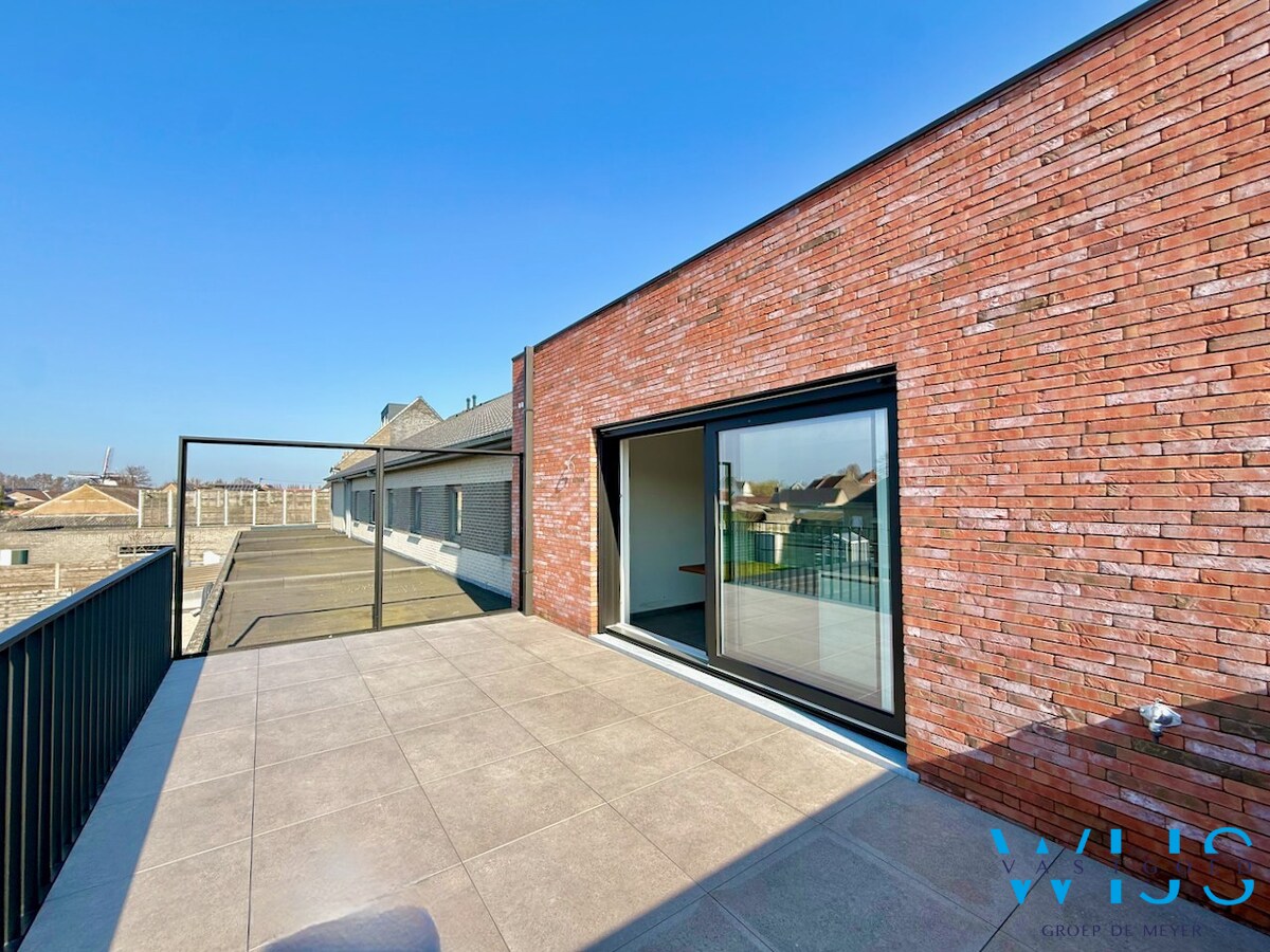 Drieslaapkamer appartement met garage in hartje Ertvelde ! 