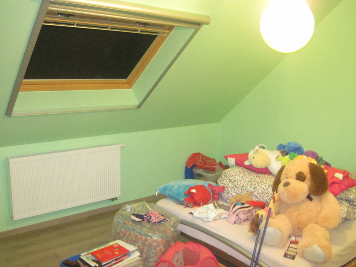 Recent vernieuwde rijwoning nabij de Schelde. 