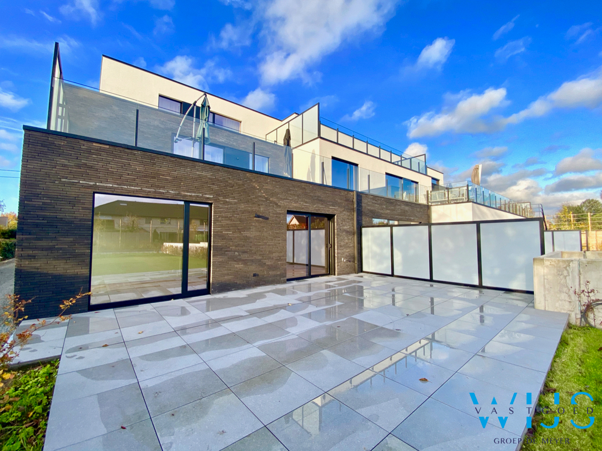 Zeer aangenaam gelijkvloers appartement met tuin te Belzele ! 