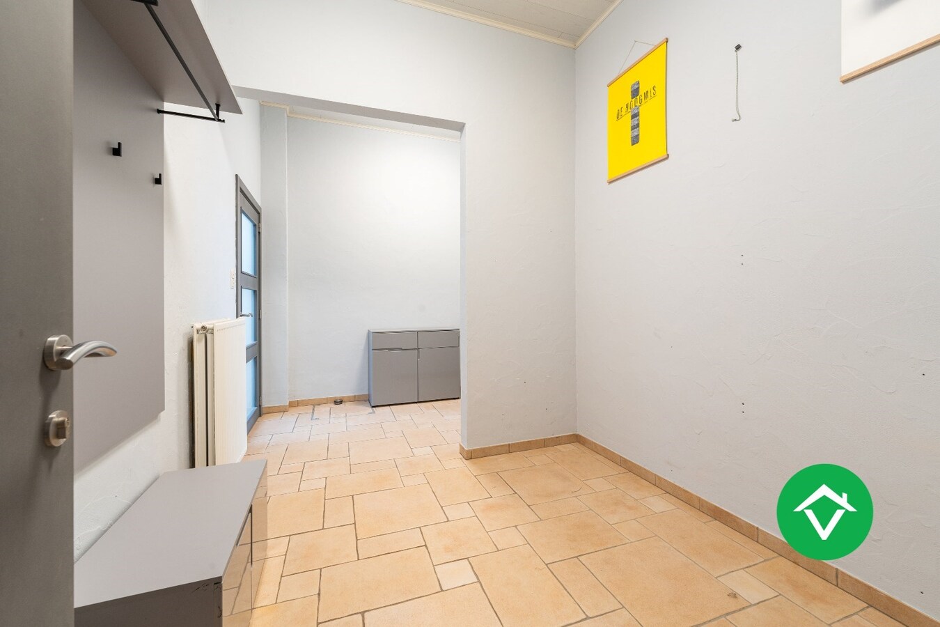 Woning met appartement te koop in het centrum van Eernegem 