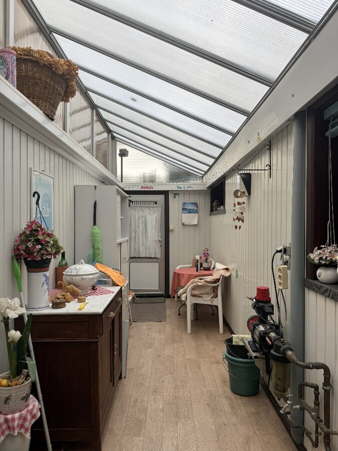 Te renoveren rijwoning met garage nabij het centrum van Avelgem 