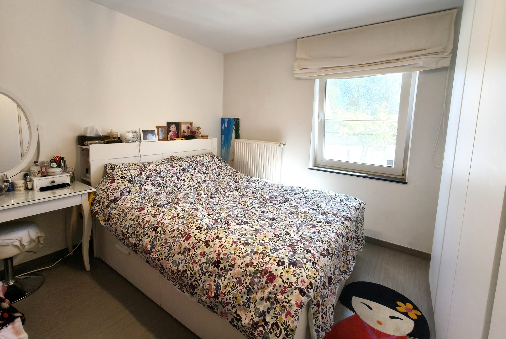 RUIM GELIJKVLOERS APPARTEMENT MET TUIN EN GARAGE 