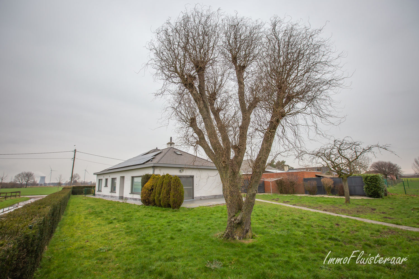 Instapklare moderne bungalowwoning met loods en aanpalende weilanden op 6929m². 