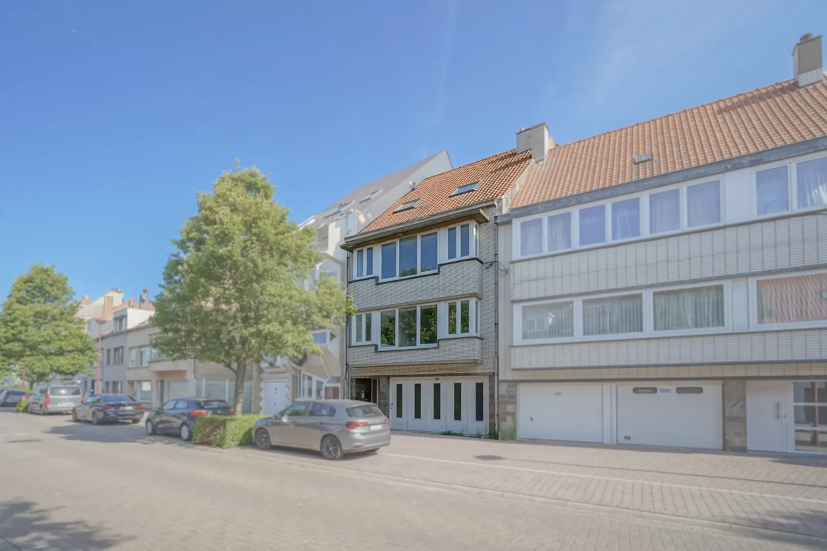 Vergund opbrengsteigendom (4 appartementen + garage)