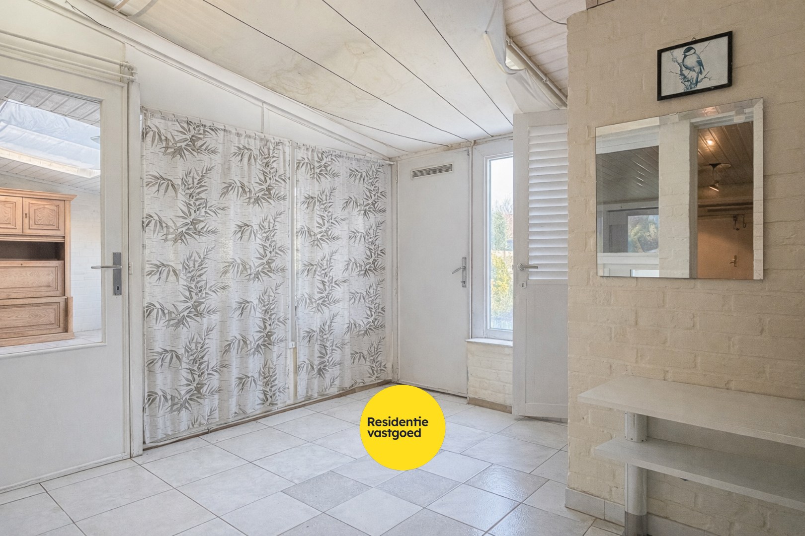 Ruime woning met zuidgerichte tuin te Sint-Michiels 