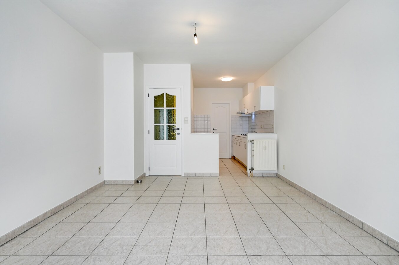 Centraal gelegen appartement met ondergrondse garage en groot terras 