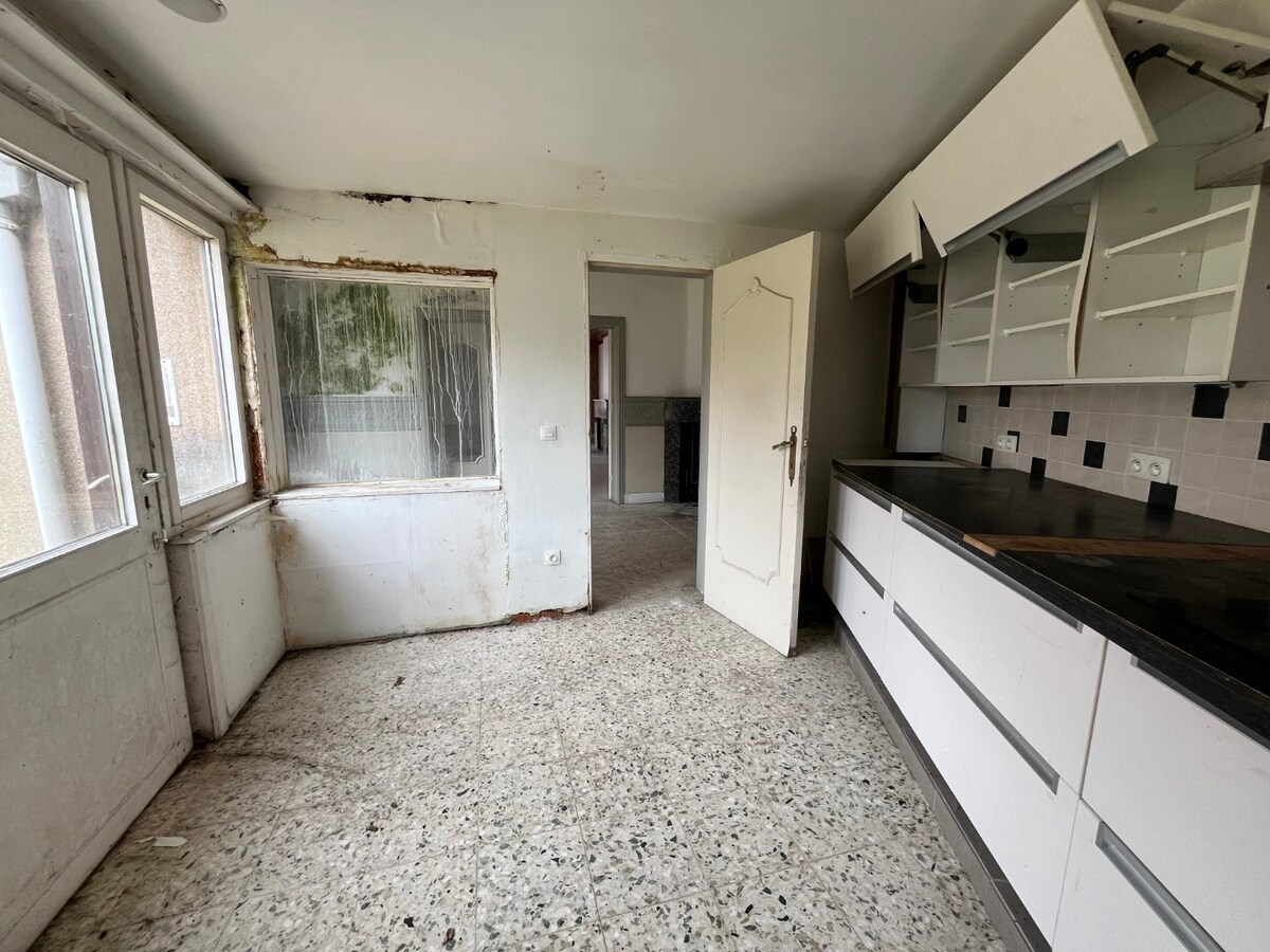 Te renoveren half open bebouwing te Gavere 