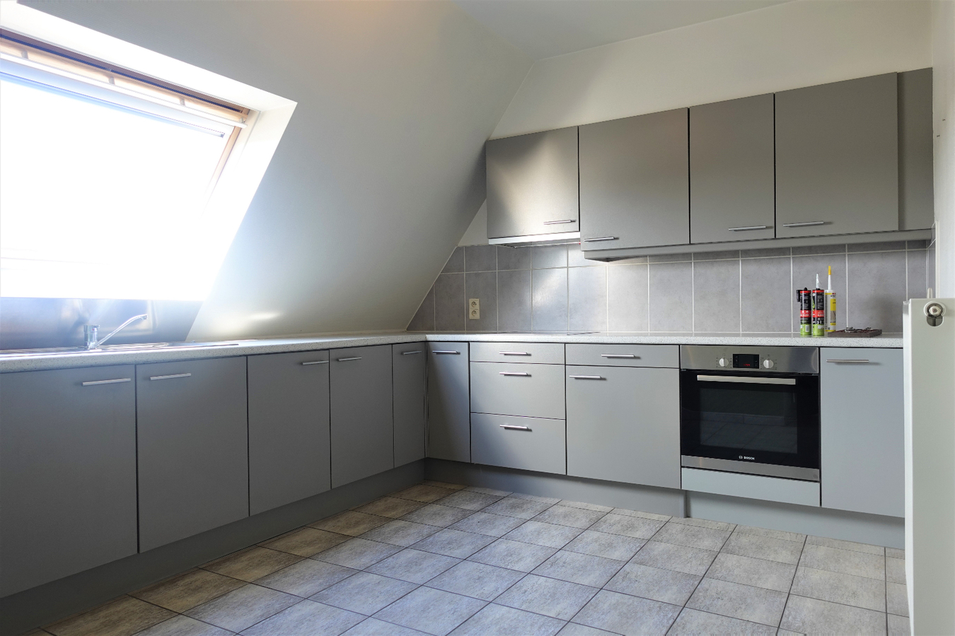 Ruim dakappartement in het centrum van Gistel 