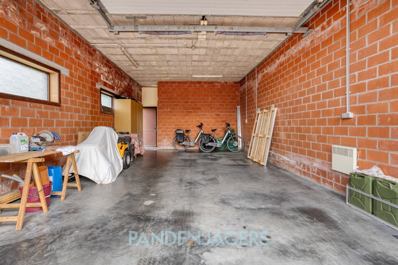 Ruime open bebouwing met groot bijgebouw te Duffel 