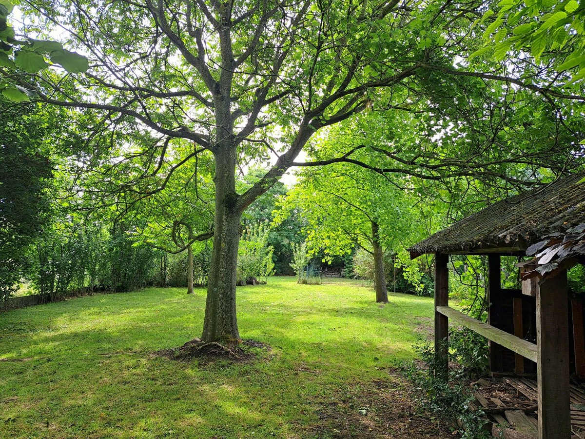 Maison style fermette alliant charme et confort bénéficiant d'un jardin exceptionnel 
