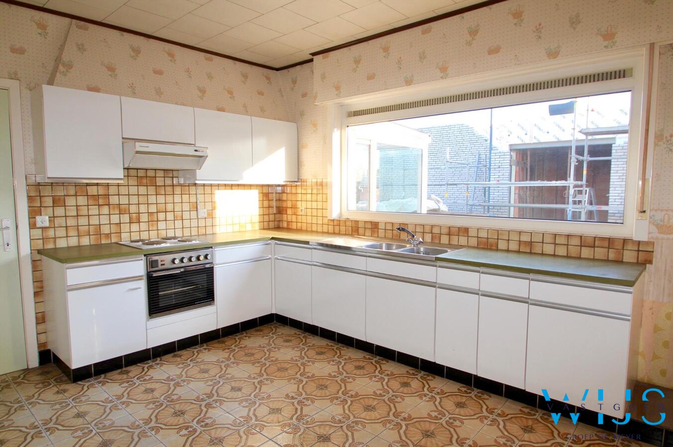 Charmante open bebouwing gelegen in gezellige wijk te Evergem! 