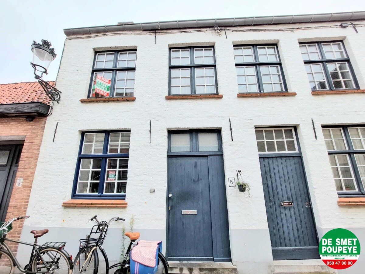 Rijwoning met gemeenschappelijk terras 