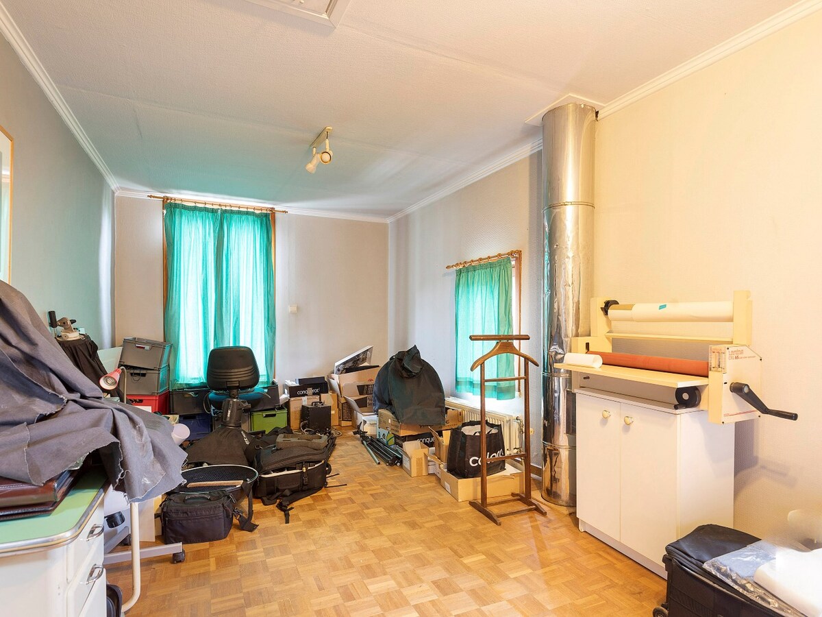 Charmant handelspand met woonst op de markt in Kruishoutem 