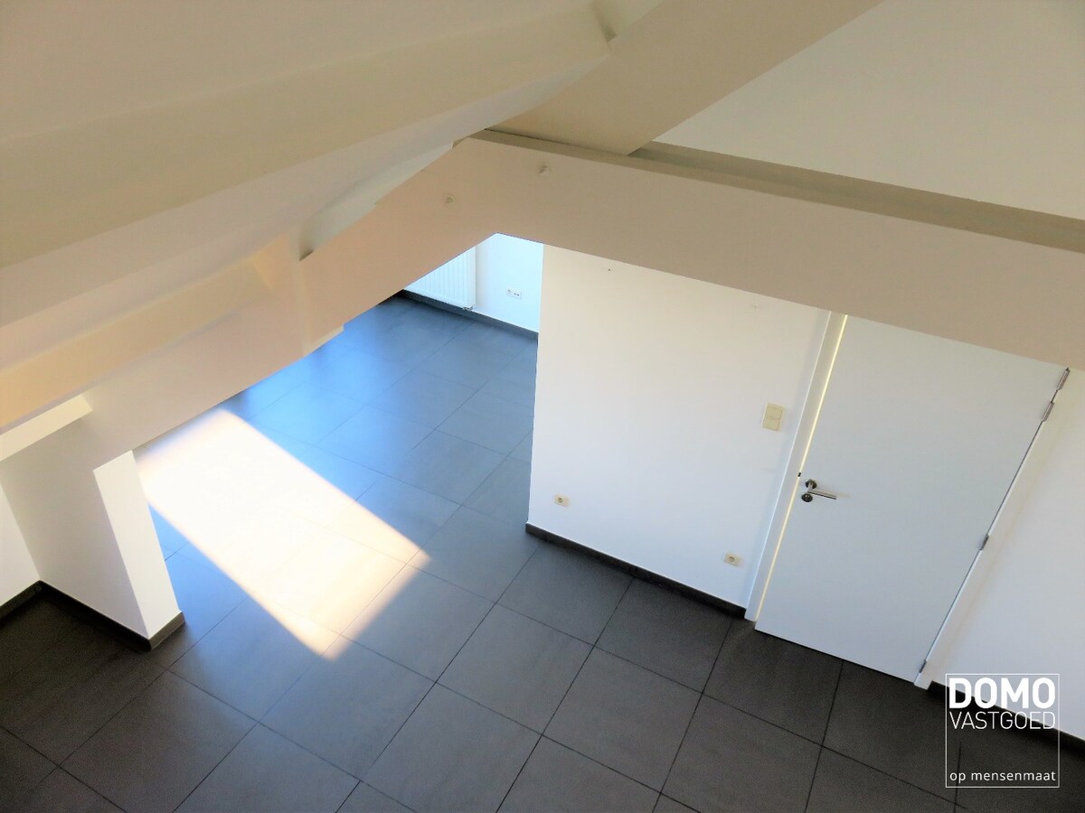 GUNSTIG GELEGEN OPBRENGSTEIGENDOM TE HASSELT 