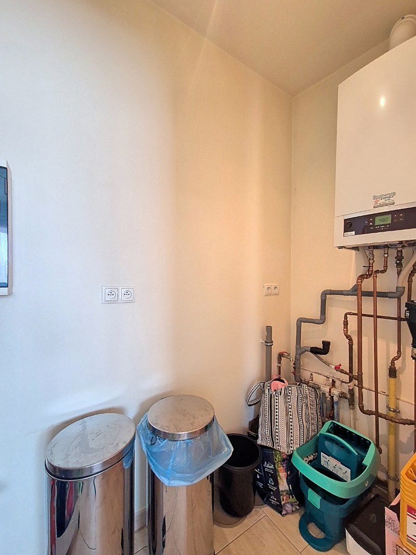 Gelijkvloers appartement met 1 slpk en garage 