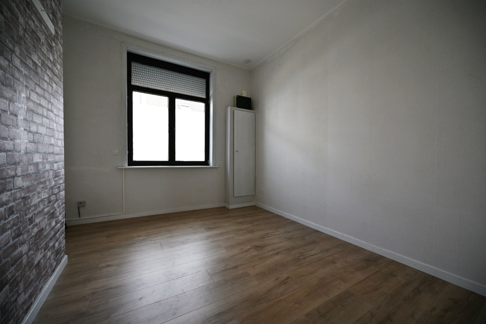 Rijwoning met 2 slaapkamers en tuintje te Eeklo 