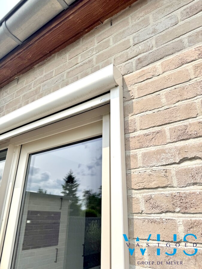 INSTAPKLAAR woonhuis met ZUIDgerichte tuin te Boekhoute ! 