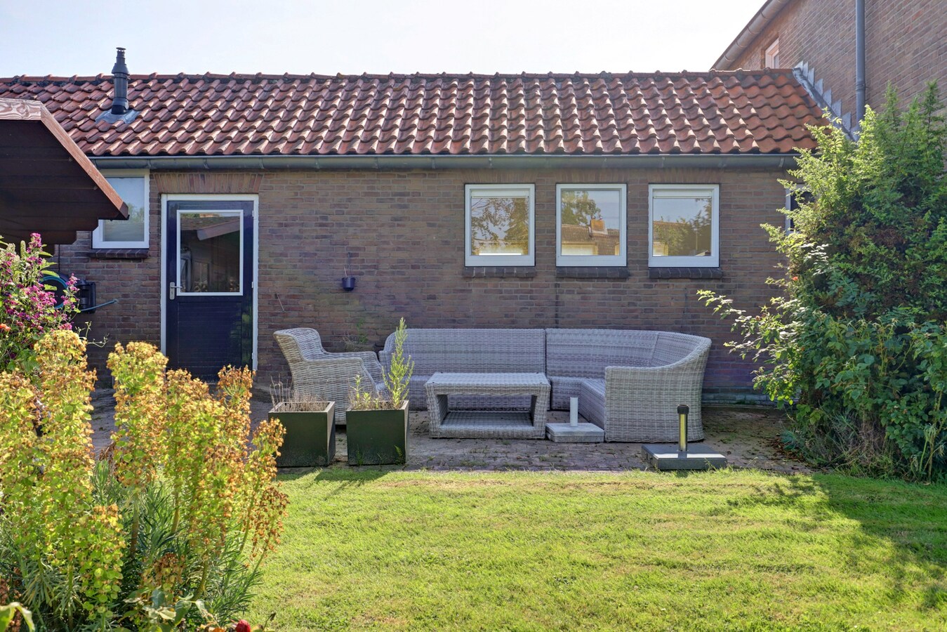 Vrijstaande woning met vijf slaapkamers, garage en royale tuin 