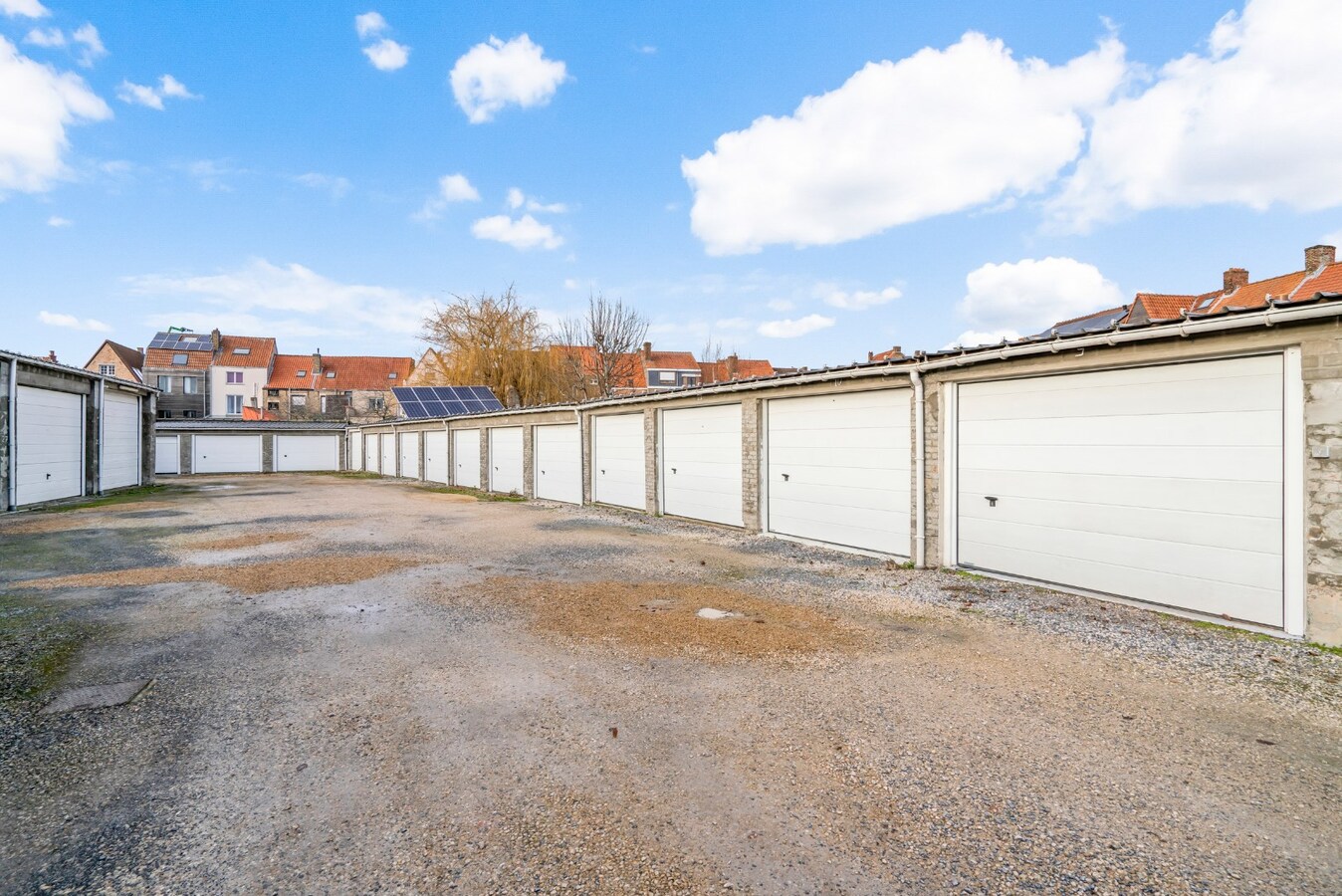 Halfopen bebouwing met terras in Christus - Koning (Stubbekwartier) 