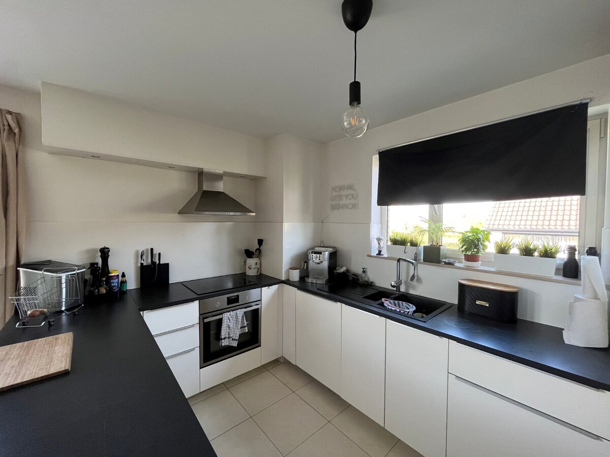 Tijdloos appartement met uitzonderlijk ruim terras 