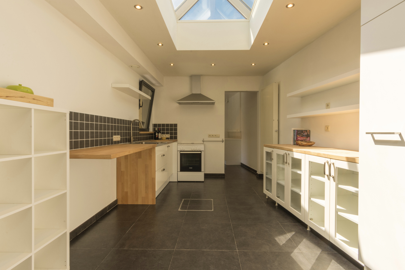 IN OPTIE Ruime en totaal vernieuwde woning in het dorp van Zaffelare 