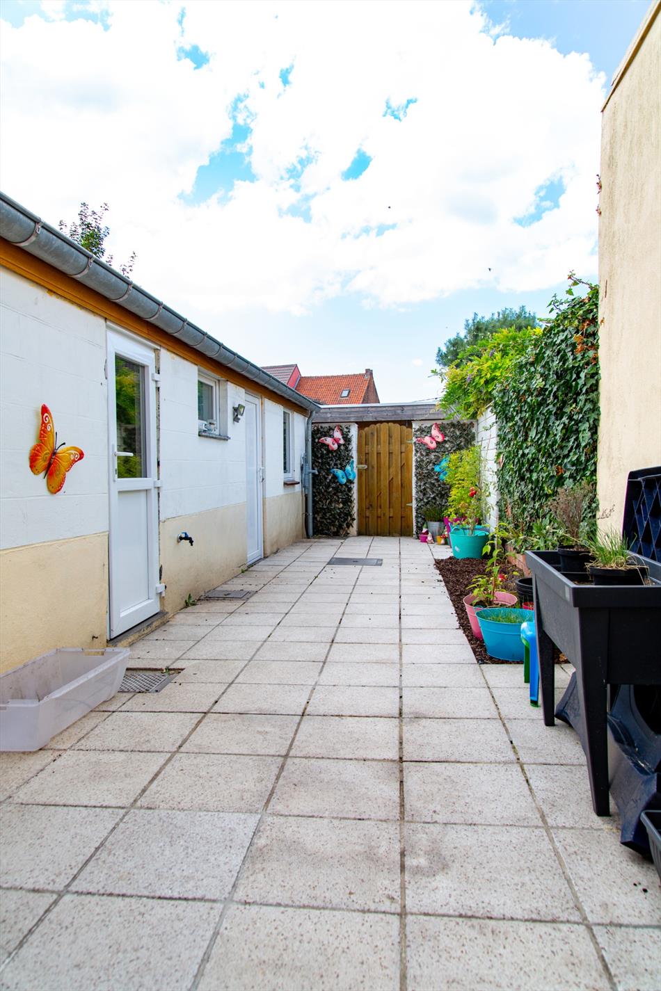 Gerenoveerde rijwoning met 2 slpks en koer te Zelzate 