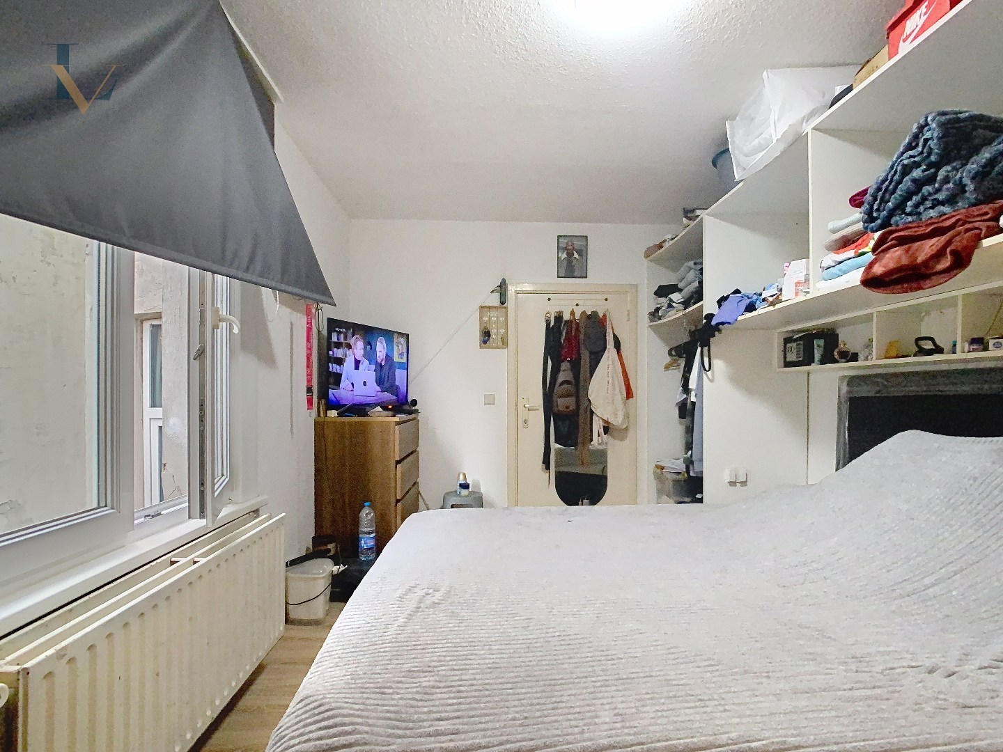 Te renoveren opbrengsteigendom met handelspand en woonunits/ ook geschikt als projectgrond 