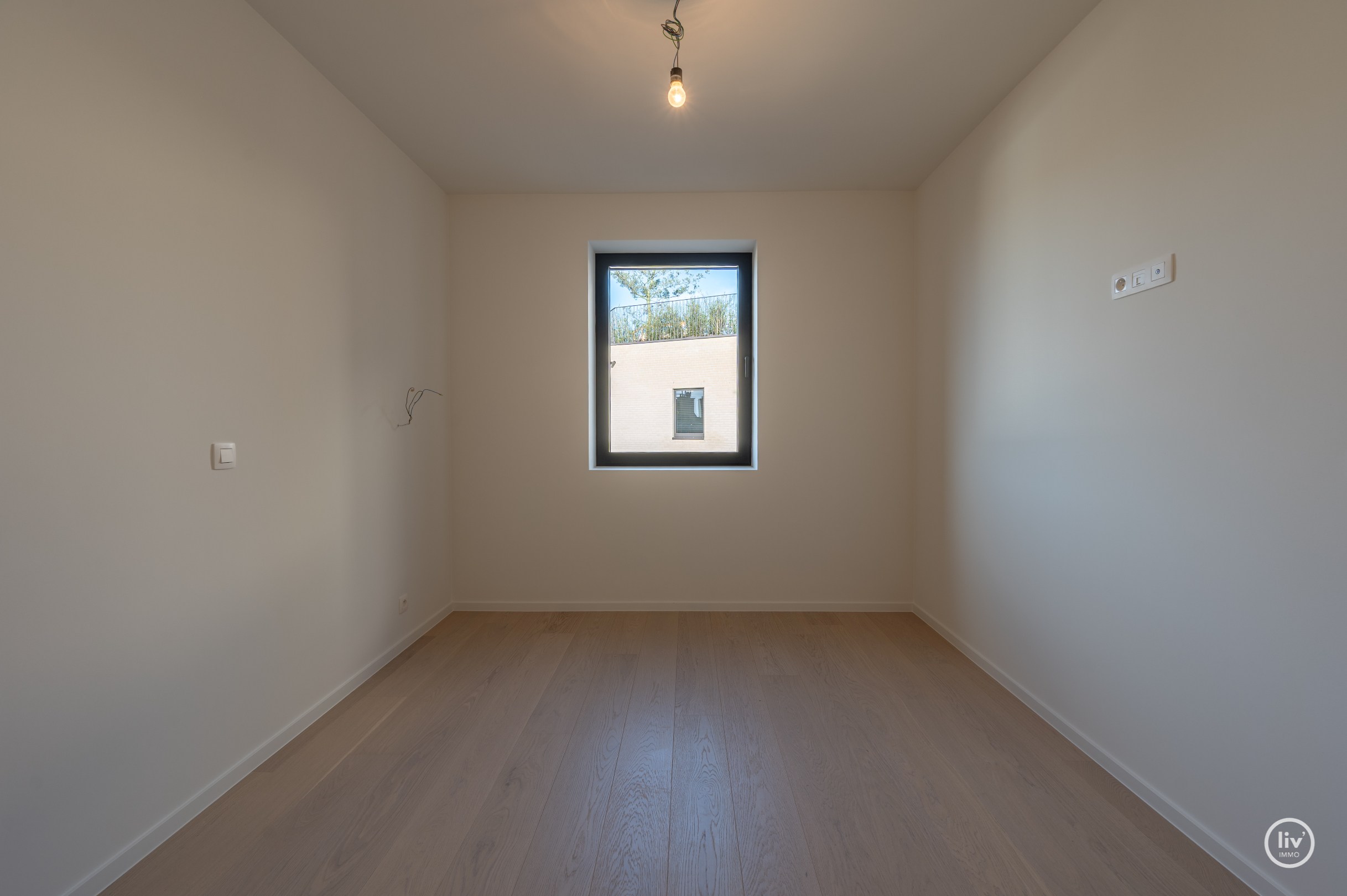 Centraal gelegen nieuwbouw-appartement in de residentie Maurice (met mogelijkheid tot aankoop van een inpandige autostaanplaats). 