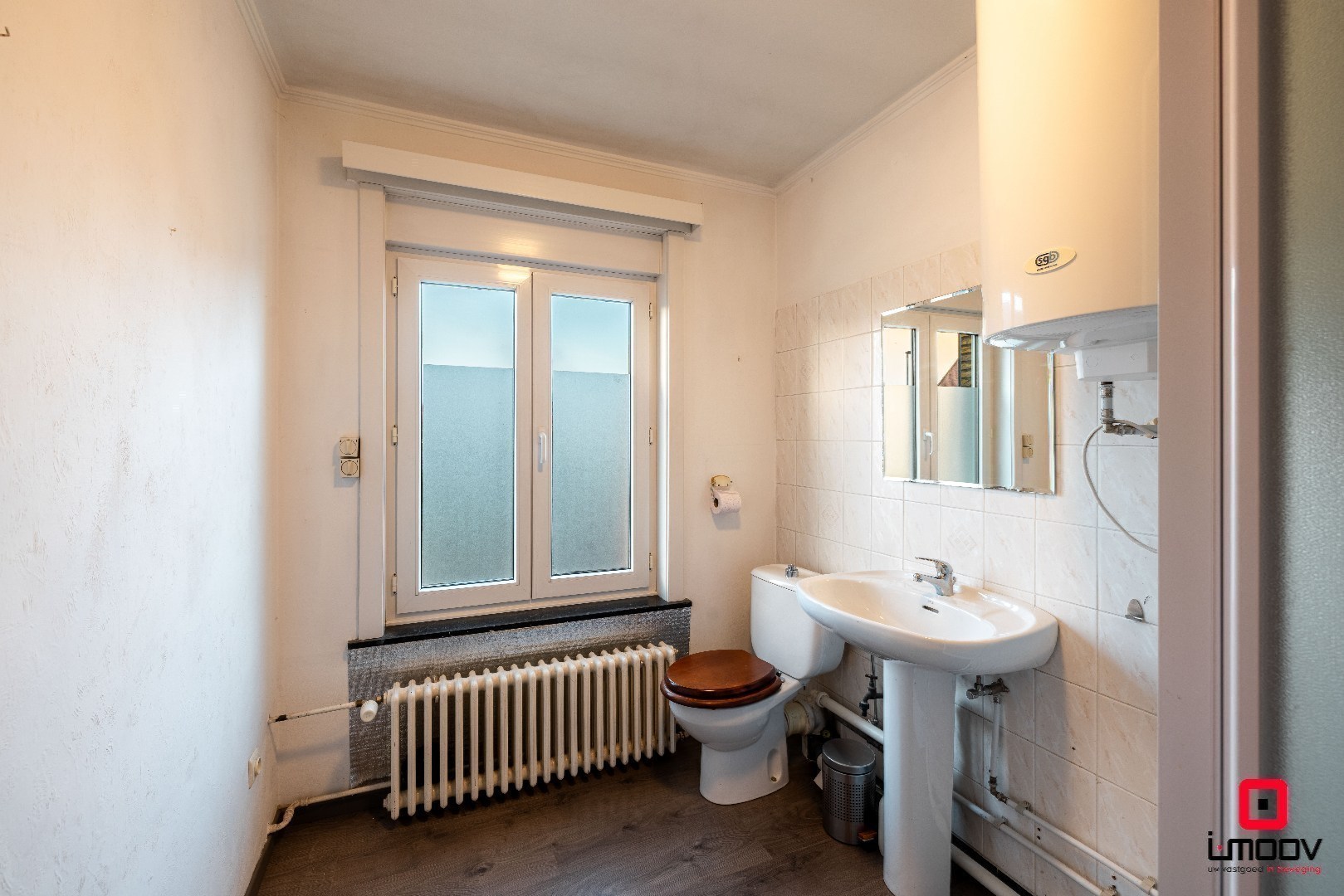 Charmante naoorlogse woning met veel potentieel te Zwijnaarde 