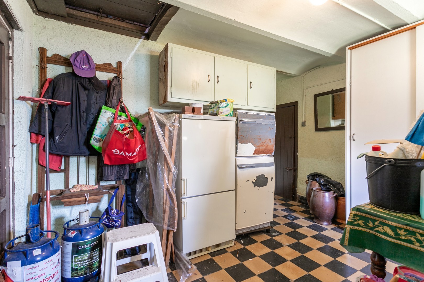 Karaktervolle, te renoveren herenhuis met enorm potentieel te Gooik 