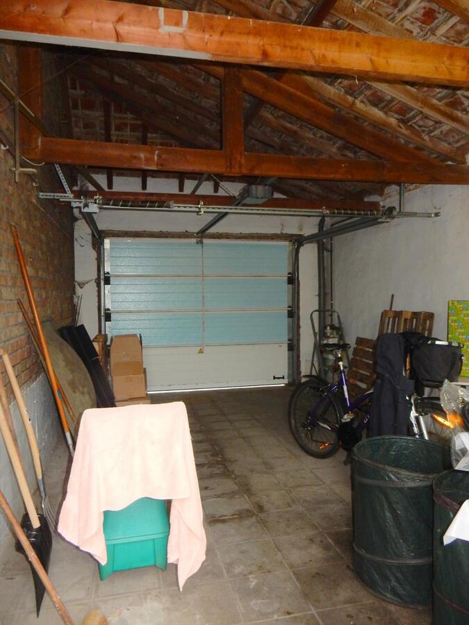 Woning met zonnige tuin en garage 