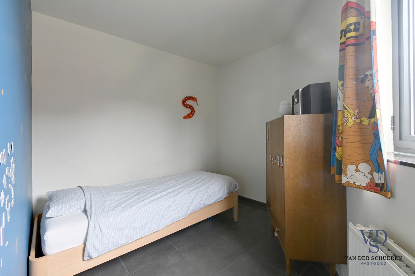 Ruim appartement in hartje Zingem. 