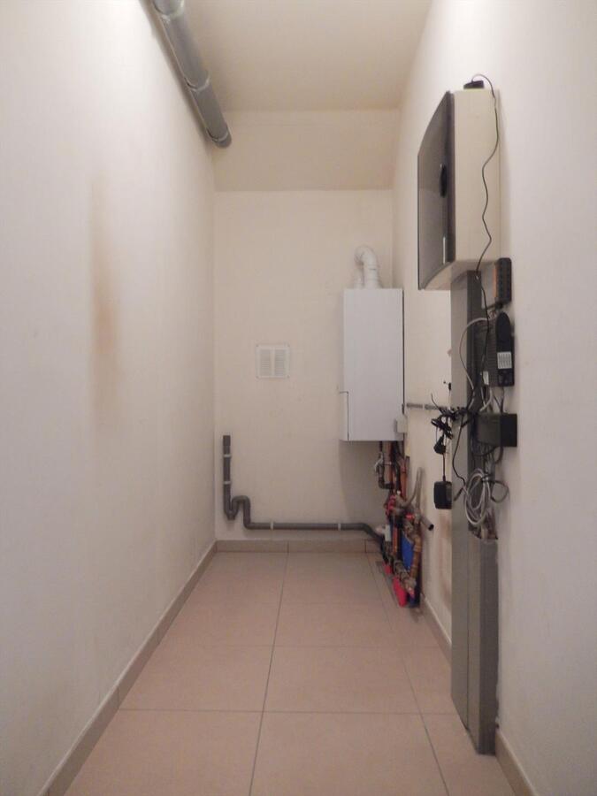 Gezellig en lichtrijk 2 slaapkamerappartement met garage 