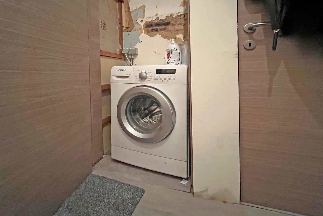 2 appartementen met gelijkvloers  magazijn 