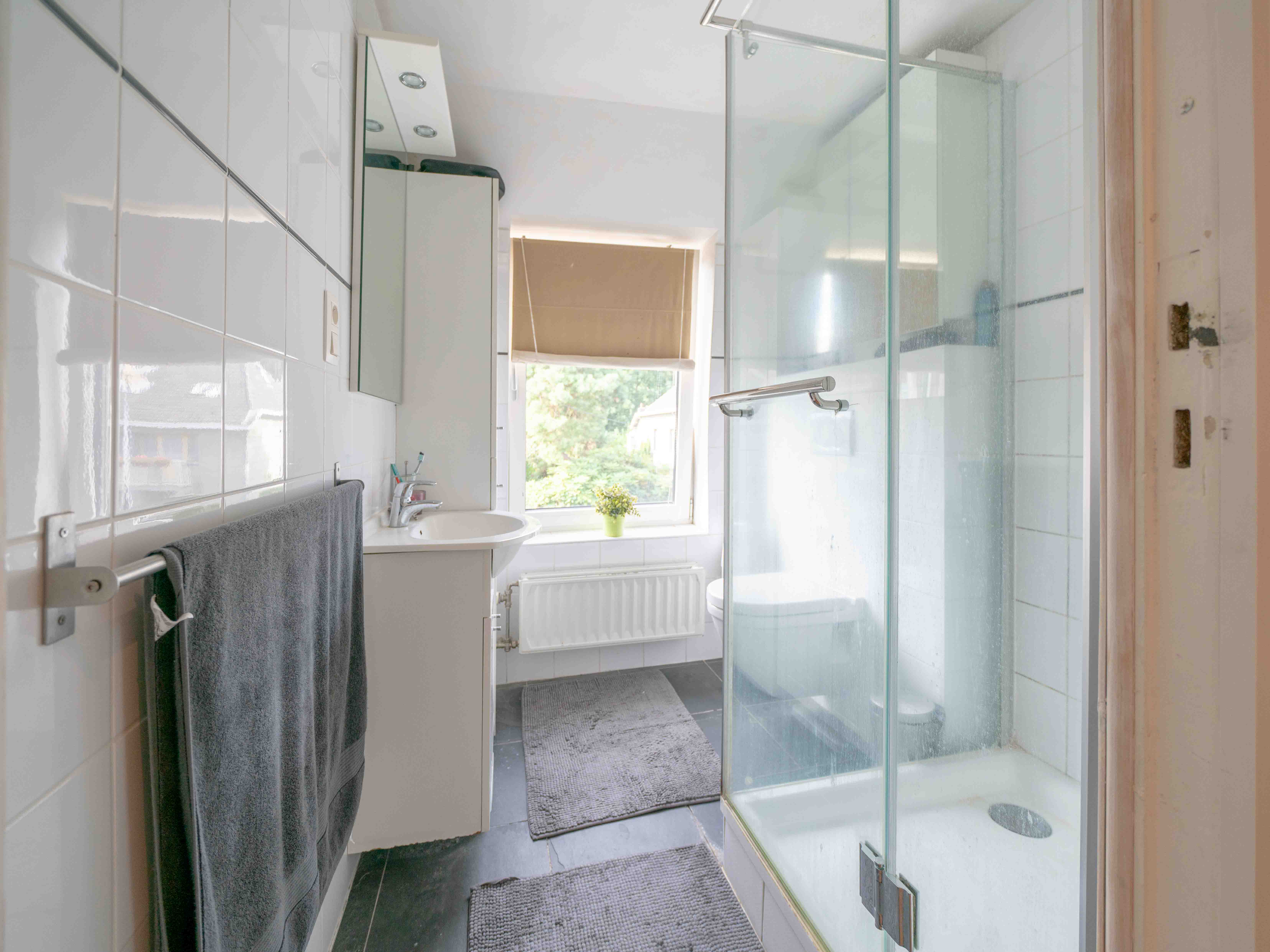 Zeer charmante eengezinswoning + projectgrond voor 2 app. 