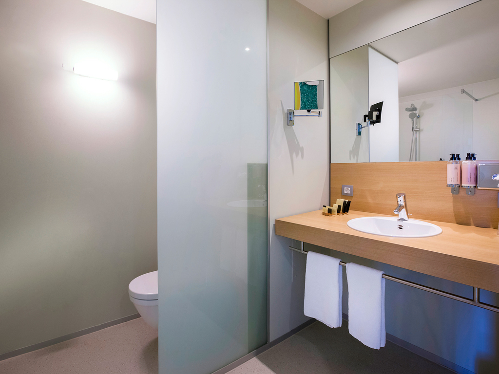 Investeer in een ruime hotelkamer in het ibis Styles Kortrijk hotel! 
