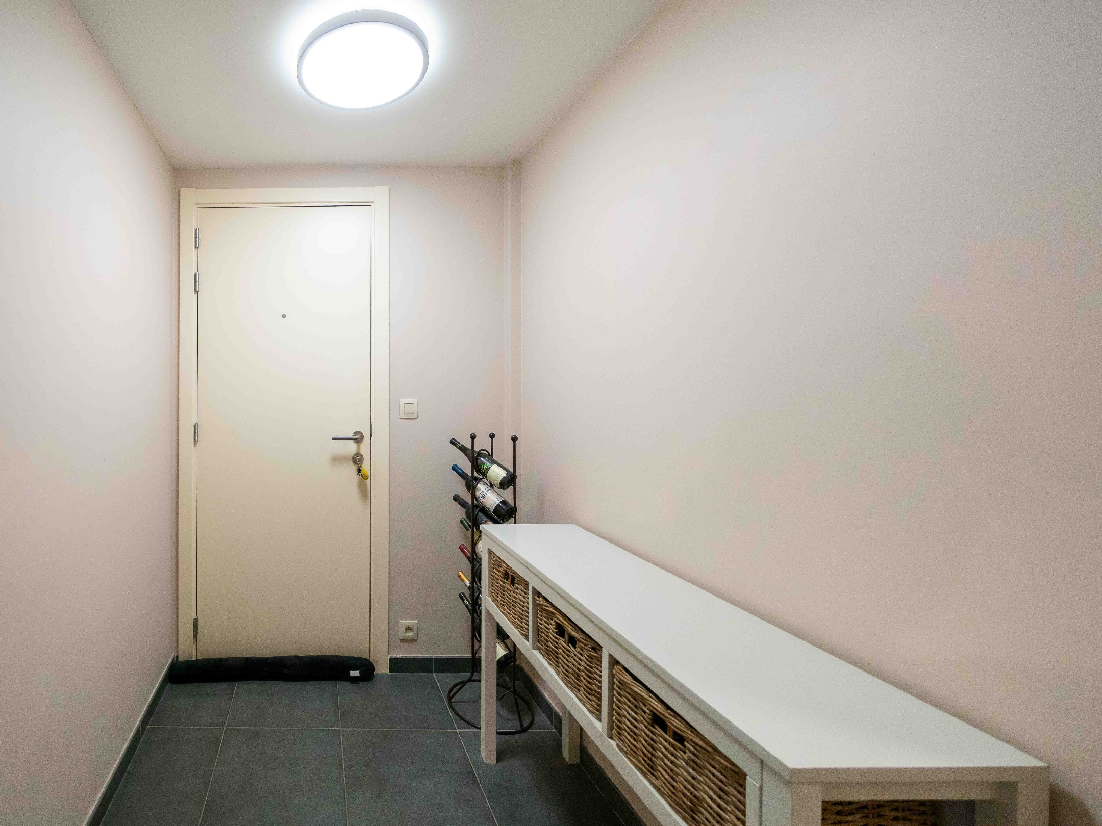 2-kamer appartement met tuin en autostaanplaats 