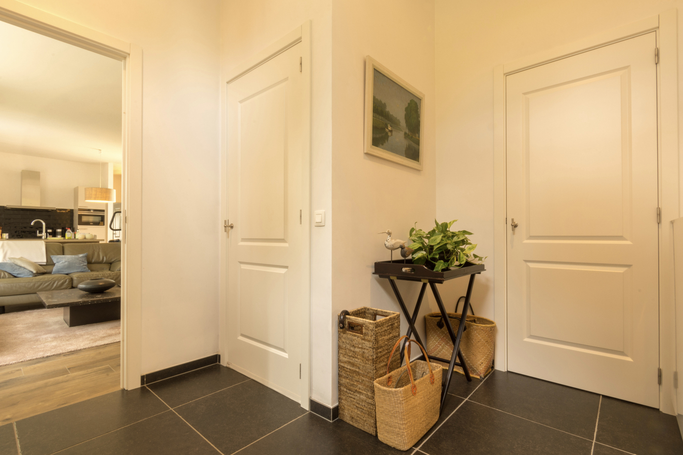 Gelijkvloers luxe 2-slk-appartement met privatieve tuin. 