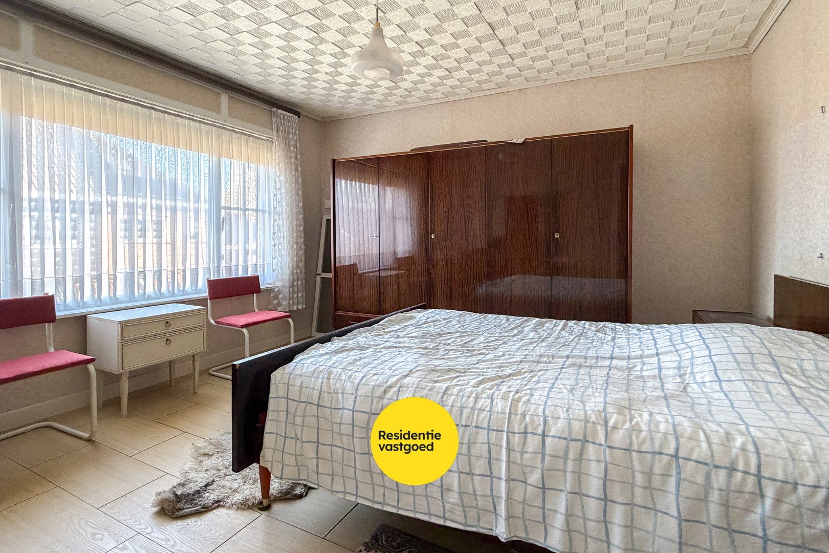 Ruime woning met zuidgerichte tuin te Sint-Michiels 