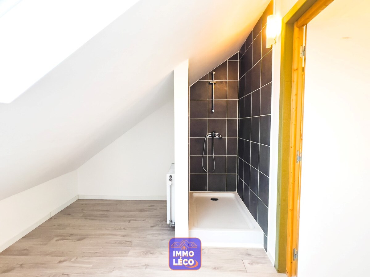 Appartement « DUPLEX » avec garage, idéalement situé 