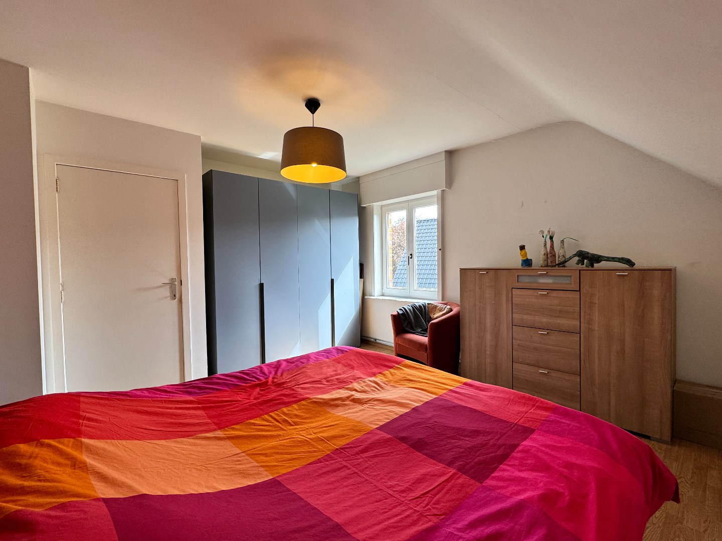 Instapklare halfopen bebouwing met 3 slaapkamers, tuin en garage te Zulte. 