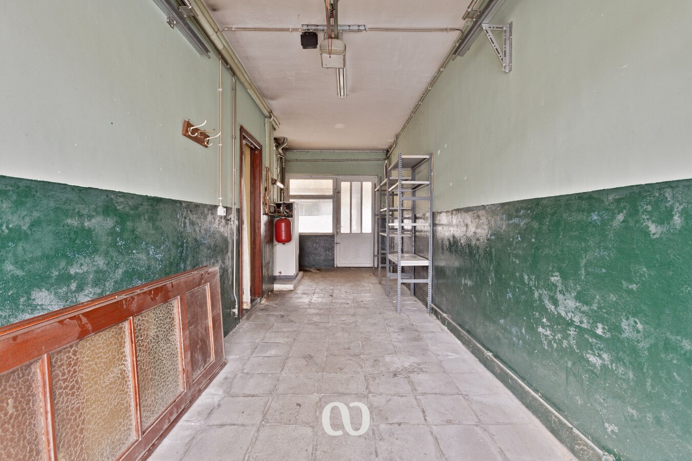 Te renoveren gezinswoning met mooie tuin in Oudenaarde 