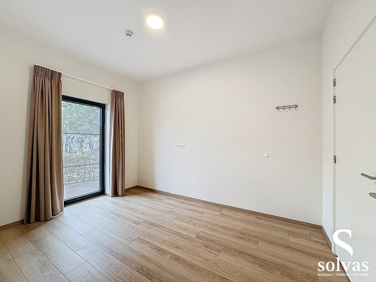 Gelijkvloers appartement met 2 slaapkamer, terras en tuintje 